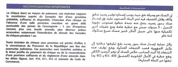 Text in French and Arabic on the back of a check