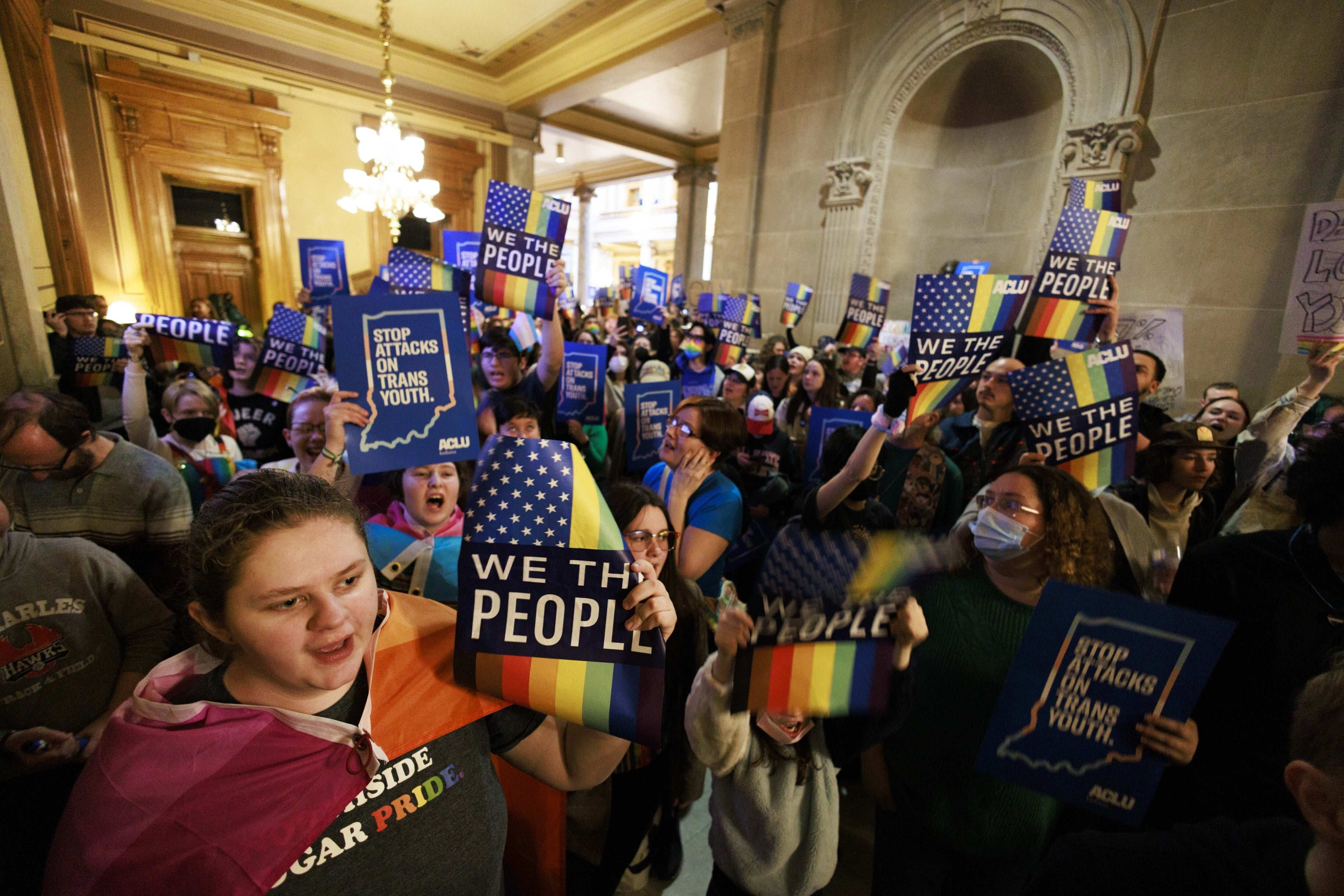Protesters in the hall outside the Indiana House of Representatives during the education committee’s hearing on the “Don’t Say Gay” bill, in Indianapolis, February 20, 2023.