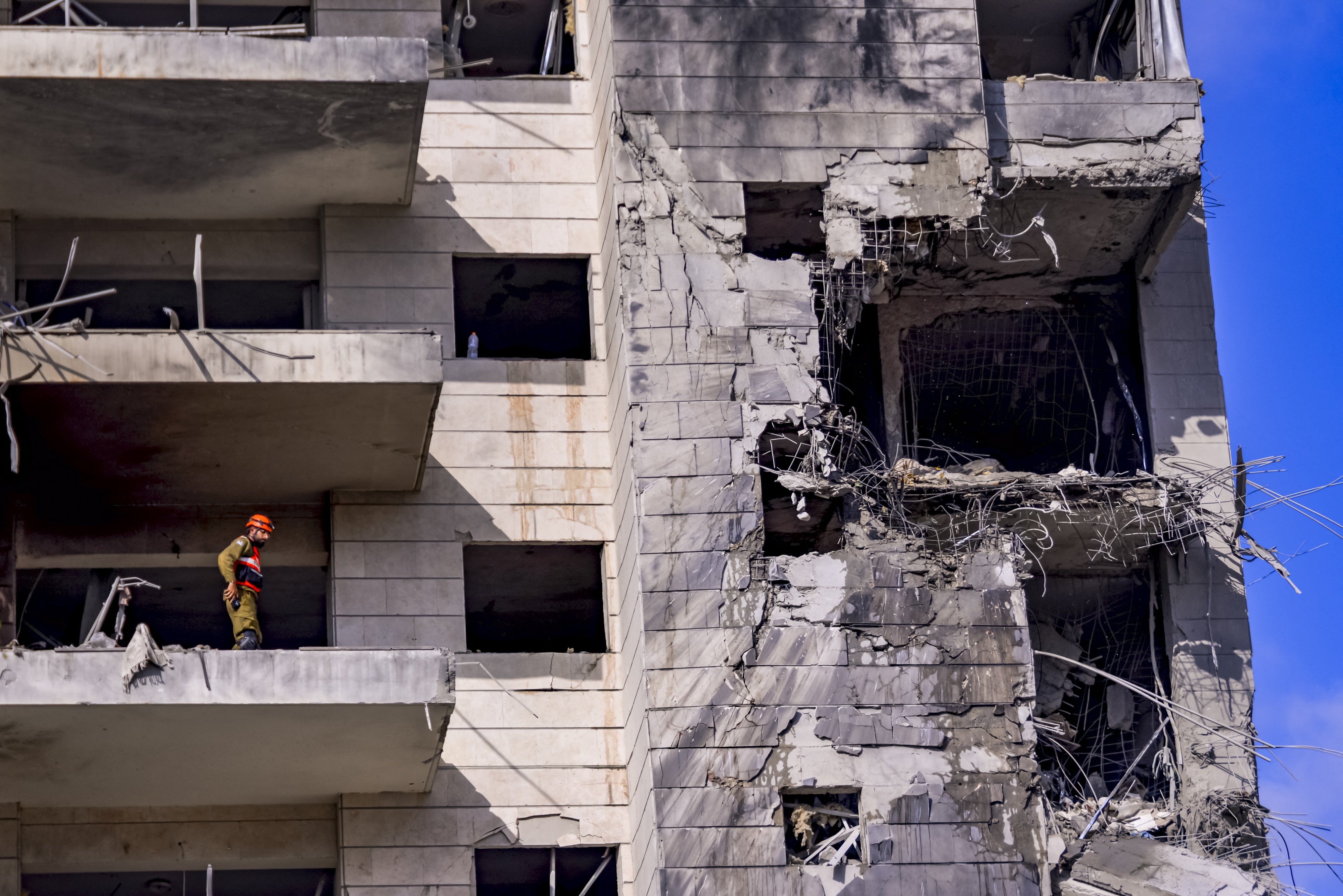 Damage on the building struck by an Iranian ballistic missile in the Israeli city of Petah Tikva, east of Tel Aviv, on June 16, 2025. 