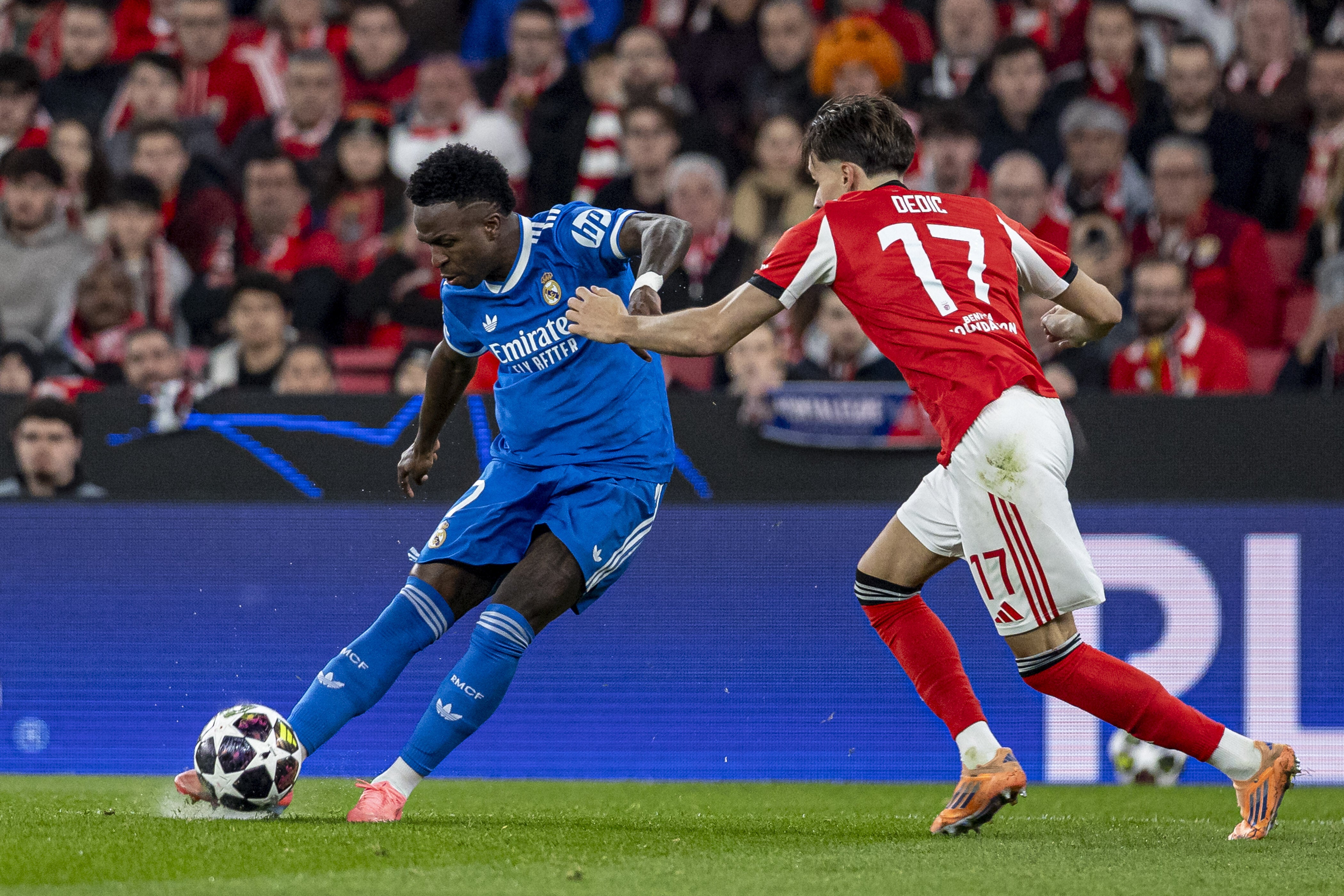 Real Madrid's Vinicius Junior shoots the ball to score teams first goal during a Champions League playoff soccer match between SL Benfica and Real Madrid in Lisbon, Portugal, February 17, 2026. 