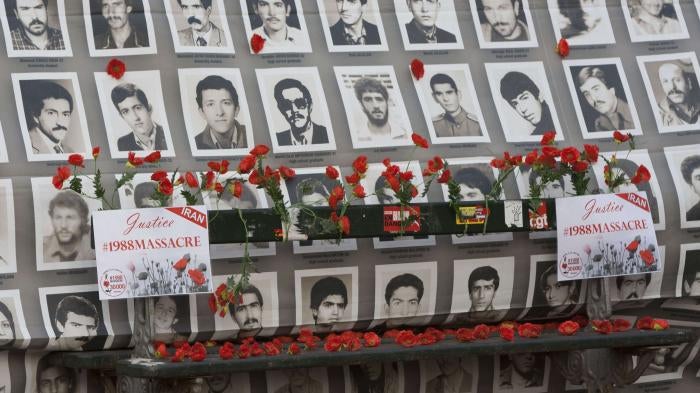 A human rights exhibition on Iran during the international campaign to demand justice for the victims of the 1988 massacre, held near the French National Assembly in Paris, November 14, 2017.