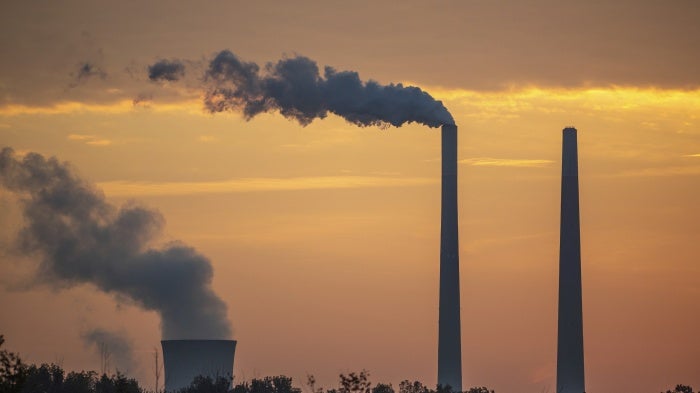 Pollution and steam rise from the stacks of the Miami Fort Power Station, along the Ohio River, in Lawrenceburg, Indiana, US, September 21, 2025.
