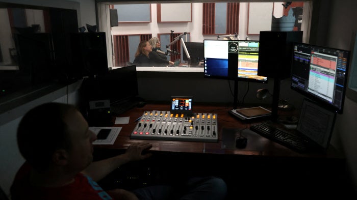 Employees of the Hungarian radio station Klubrádió work at its headquarters in Budapest, Hungary, February 6, 2025.