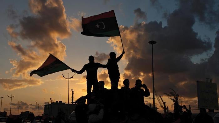 In Benghazi, Libya, on February 15, 2013 Libyans wave their national flags during a celebration to commemorate the second anniversary of the revolution that ousted Muammar Gaddafi. 