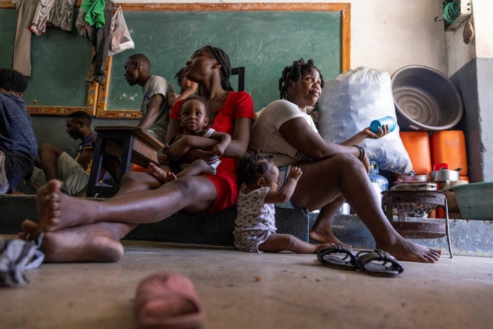 People displaced by criminal violence take refuge at the Antenor Firmin high school transformed into a shelter, in Port-au-Prince, Haiti, May 1, 2024.