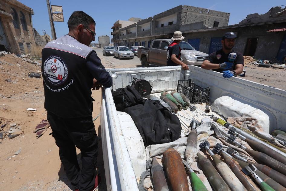 National Safety Authority members clear landmines and improvised explosive devices used during the armed conflict in Tripoli, Libya, June 3, 2020.