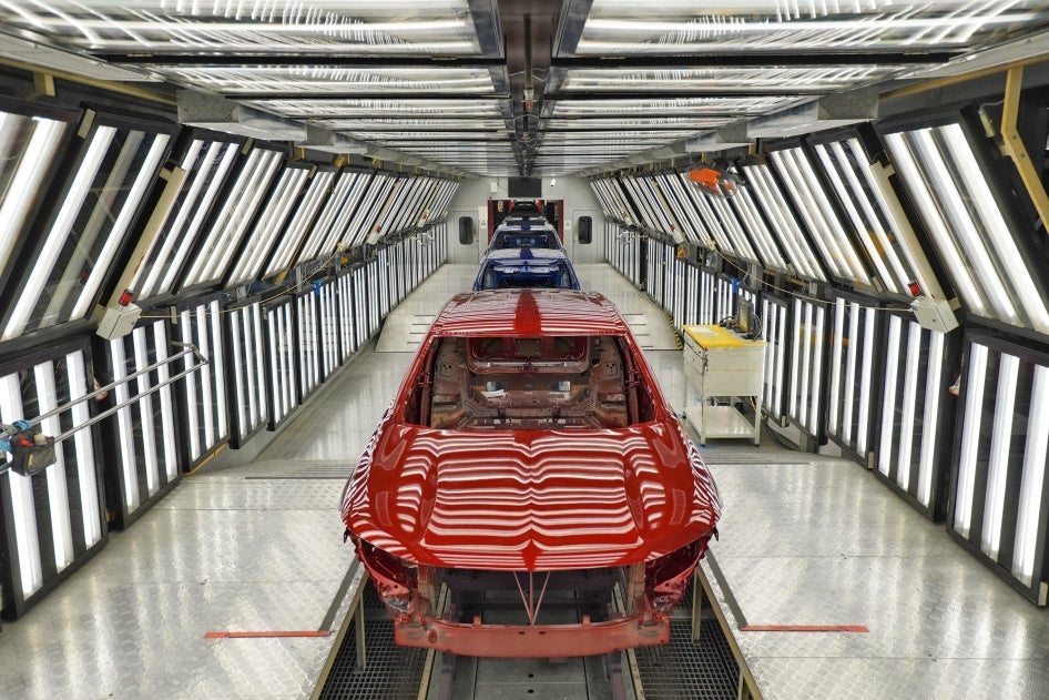 Cars are delivered on a production line at SAIC General Motors Dongyue Automobile Co. Ltd. in Yantai, Shandong province, China, November 17, 2022. 