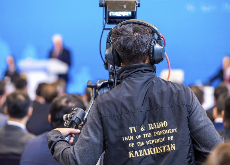 A cameraman from the "TV & Radio Team of the President of the Republic of Kazakhstan" films during the German-Kazakh Economic Forum, Astana, Kazakhstan, June 20, 2023.