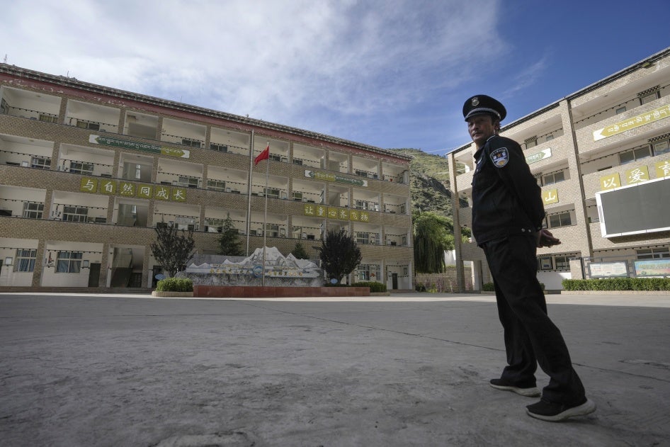 A security guard outside the Shangri-La Key School in Kardze prefecture, Sichuan province, China, September 5, 2023.