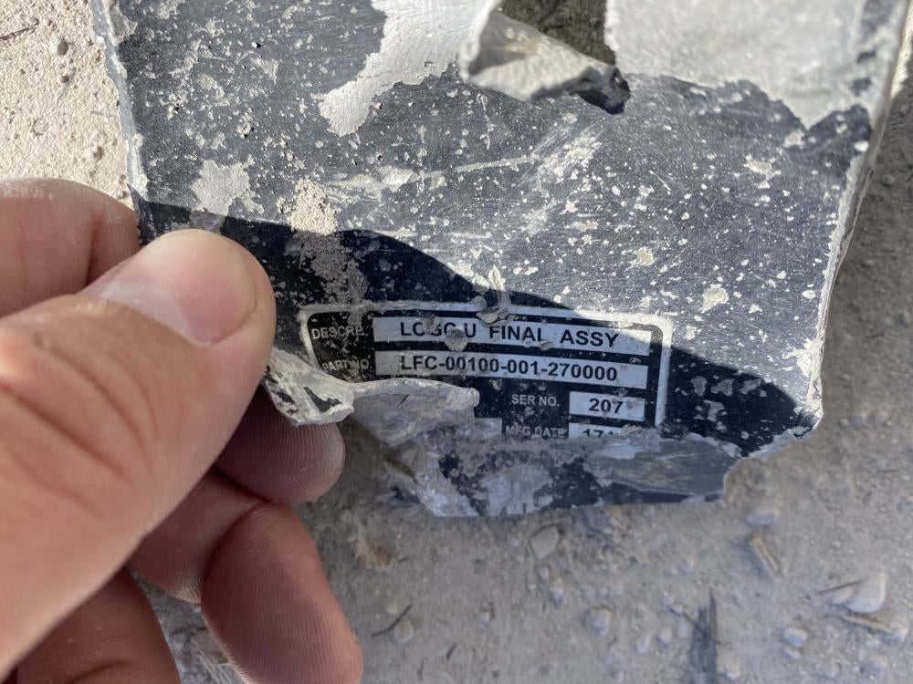 A remnant with a data plate containing alpha-numeric codes