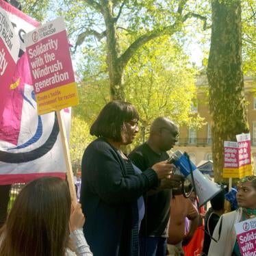Members of the Windrush generation and their families are joined by then-shadow home secretary Diane Abbott (center) at a rally outside Downing Street in London, May 5, 2018.