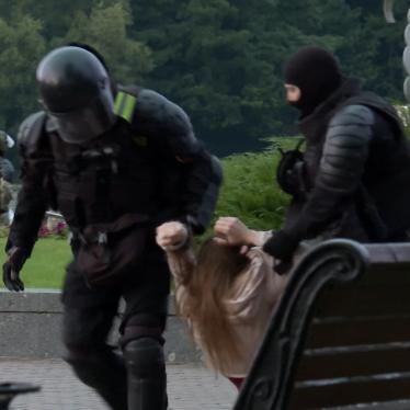 Belarusian security forces dragging protester
