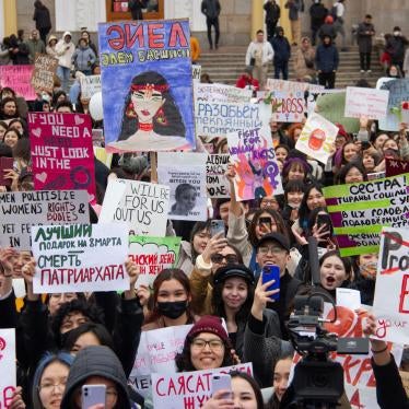 Participants of the rally holding signs