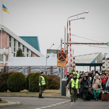 People fleeing Ukraine enter Poland through the border crossing Korczowa, Poland, March 4, 2022.