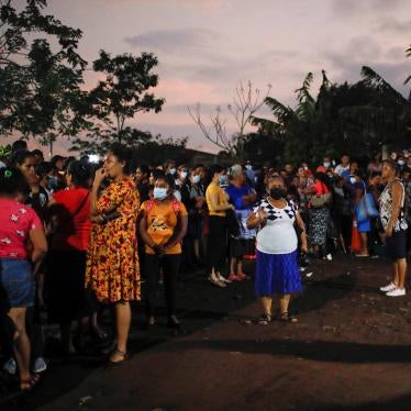 People wait for news of the release of relatives detained during the state of emergency in El Salvador, at the security perimeter of the Izalco prison in Izalco, El Salvador, on April 28, 2022.