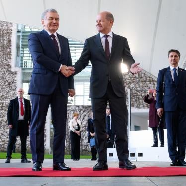 German Chancellor Olaf Scholz (R) welcomes Shavkat Mirsiyoyev, President of Uzbekistan, in front of the Chancellor's Office in Berlin, Germany, May 2, 2023.