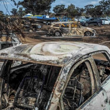 A view of destroyed vehicles near the grounds of the Supernova electronic music festival. 