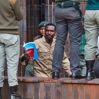 Blessed Mhlanga walking in Harare.