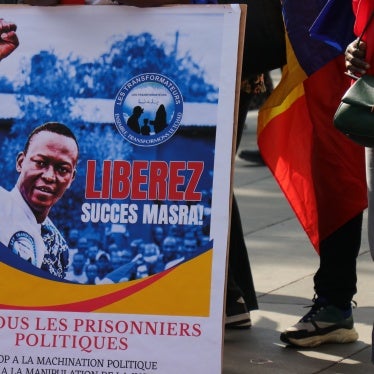 A poster calling for the release of Succes Masra at a protest in Paris.