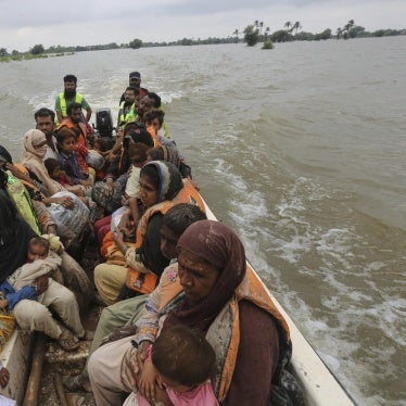 Rescue workers evacuate villagers from a flooded area in Jalalpur Pirwala, Multan district, Pakistan, September 8, 2025. 