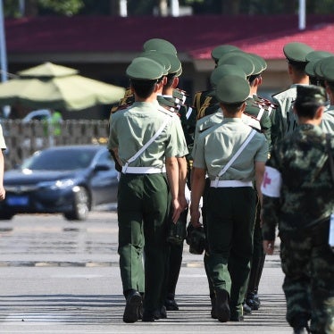 Chinese paramilitary police at the Beijing airport prepare for the departure of North Korean leader Kim Jong Un on June 20, 2018.