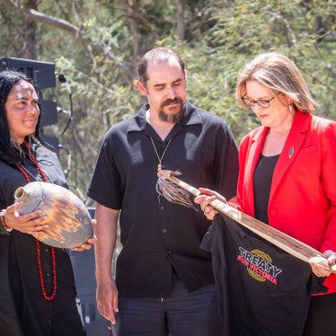 First Peoples Assembly co-chairs Ngarra Murray, left, and Ruben Berg, center, exchange gifts with Victorian Premier Jacinta Allan during the Ceremonial Opening of Treaty Negotiations on Wurundjeri Woi-wurrung country at Darebin Parklands, Victoria, Australia, November 21, 2024. 