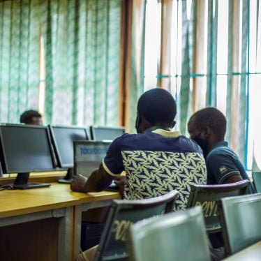 Students following up a lesson through a laptop in Blantyre, Malawi, January 13, 2021.