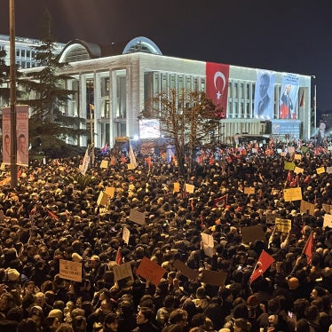 People gather outside the Istanbul municipality building in Istanbul, Türkiye, to protest the arrest of mayor Ekrem İmamoğlu, March 22, 2025. 