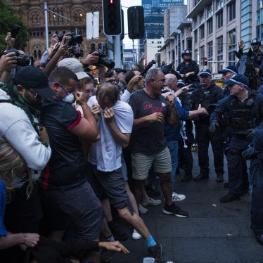 Police confronting a group of protesters
