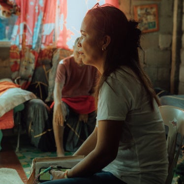 Mirasol at home in the No Build Zone with her husband in Del Carmen, Siargao, Philippines, 2025.