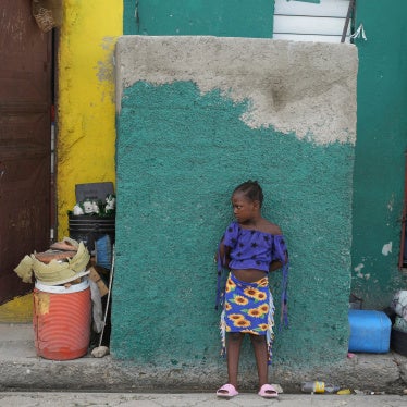 People look out at a street in the Simon-Pele neighborhood of Port-au-Prince, Haiti, September 22, 2025.