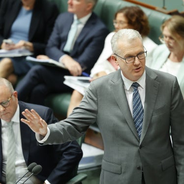 Minister for Home Affairs Tony Burke (right) addresses the chamber at Parliament House in Canberra, Australia, January 20, 2026. 