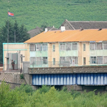 North Korean soldiers guard the bridge at the China-North Korea border in Tumen, Jilin province, July 14, 2024.