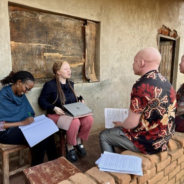 Human Rights Watch Director of the Disability Rights Division, Elizabeth Kamundia (left), and Marco Bristo Fellow for Courageous Leadership in Disability Rights, Hilda Macheso (center), interview people in Malawi, October 2025. 