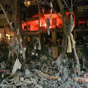 A damaged building is on fire after an Israeli airstrike in Beirut's southern suburb of Haret  Hreik, March 2, 2026.