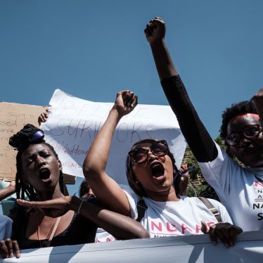 People participate in a march held to call a halt to gender-based violence on International Women's Day in Nairobi, Kenya, March 8, 2019.