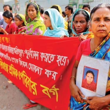  Victims of the 2013 Rana Plaza building collapse and their families demonstrating at the site of the disaster demanding full compensation. 