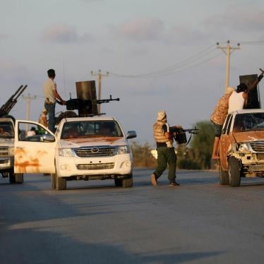 Armed forces allied to internationally recognized government fight with armed group in Tripoli, Libya September 22, 2018. © 2018 Hani Amara/Reuters