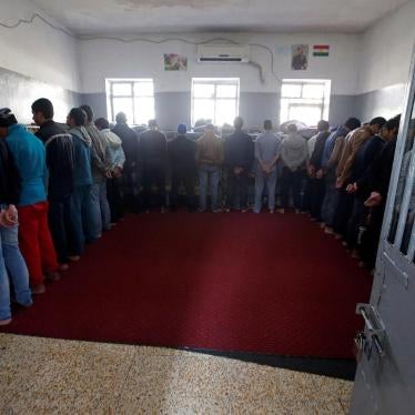 Teenagers stand inside a prison cell at the Reformatory for Women and Children in Dohuk, northern Iraq, February 12, 2017. 
