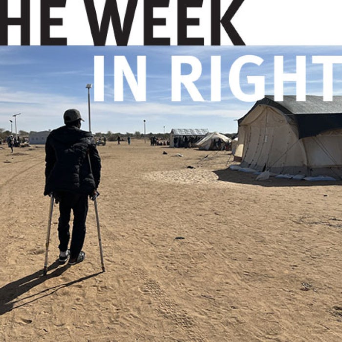 One figure walks through a road in Sudan. 